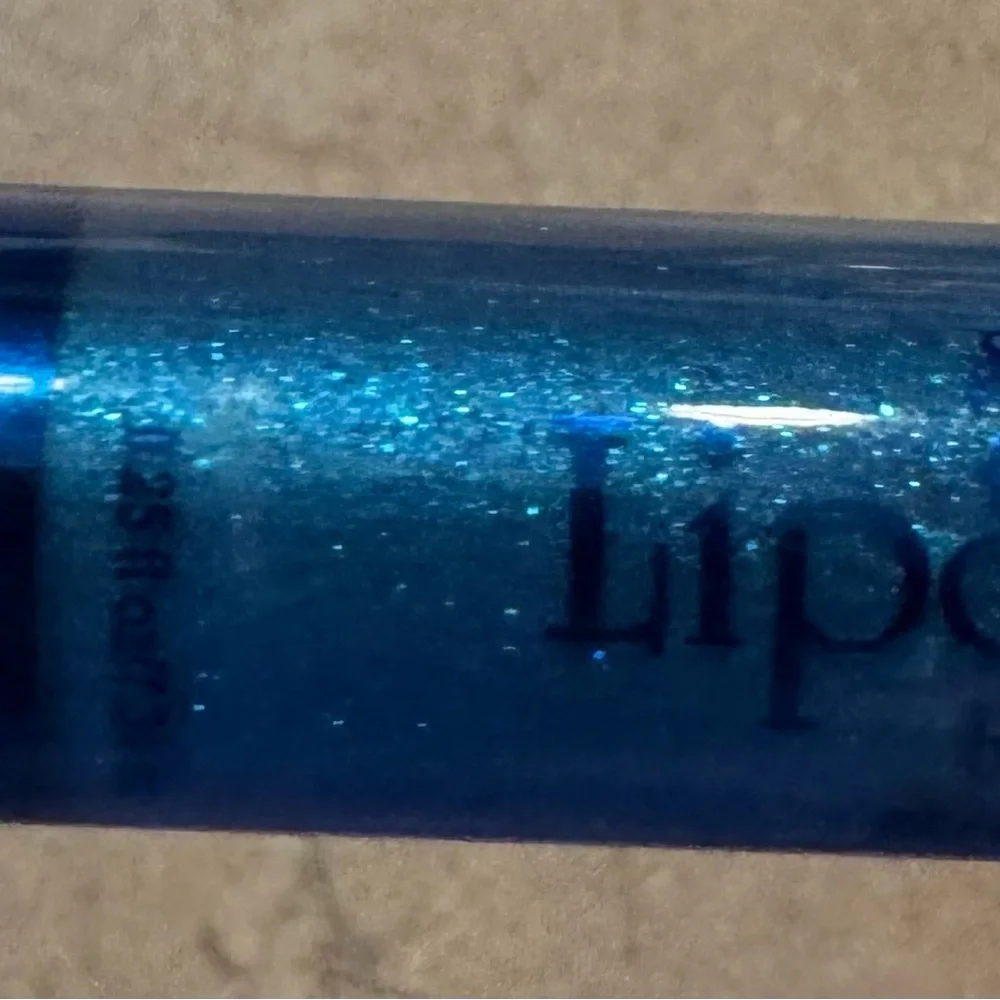 Blue orchid lip gloss by SeneGence